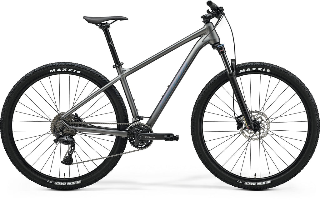 Side view of a Merida BIG.NINE 300 hardtail mountain bike with front suspension, Grey Frame and Maxxis tires.