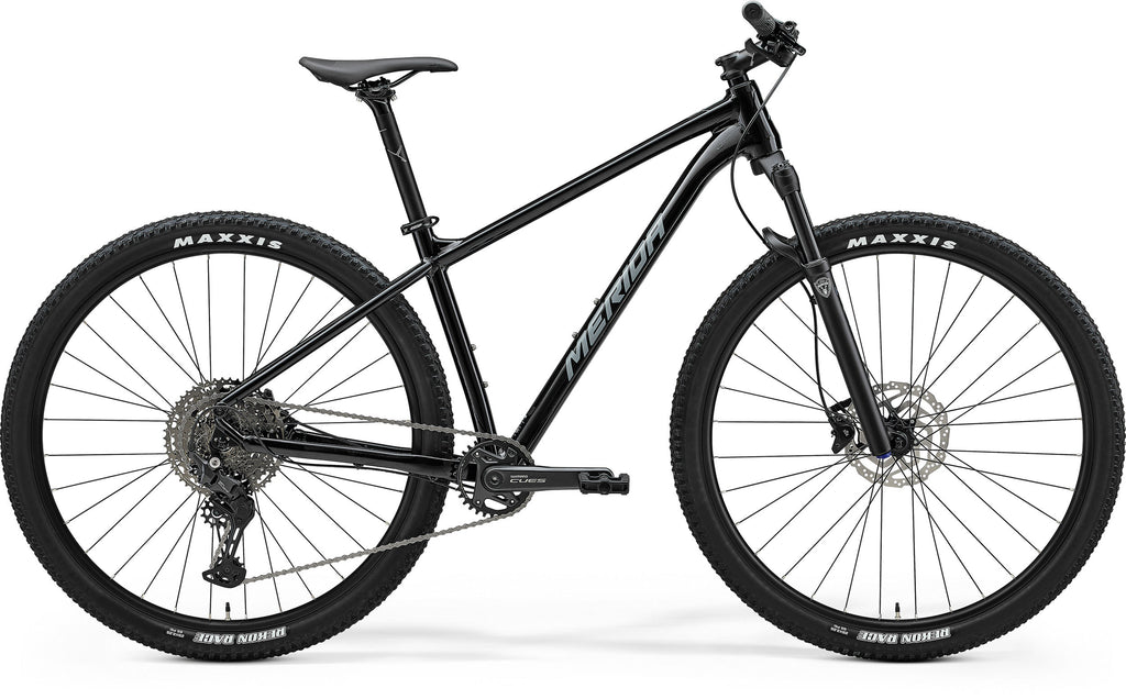 A black Merida BIG.NINE 400 hardtail mountain bike.