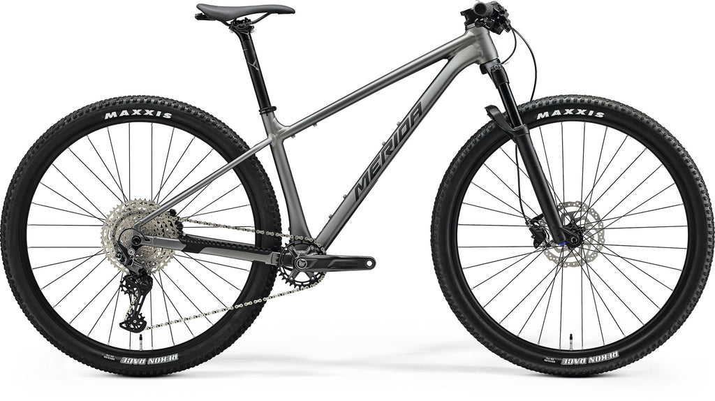 Side view of the Merida BIG.NINE 700 III1, an aluminum 29er hardtail mountain bike.