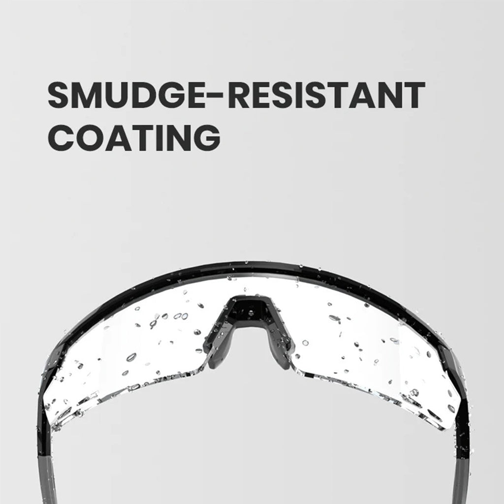 Close-up of Magicshine Rouler Basic cycling sunglasses in Black/Grey, showcasing the expansive PC lens for exceptional optical clarity and waterproof protection.