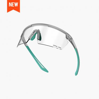 Magicshine Rouler Photochromic Sports Sunglasses in Lake Blue, featuring adaptive tint lenses and a sleek semi-frame design, ideal for cycling and varying light conditions.