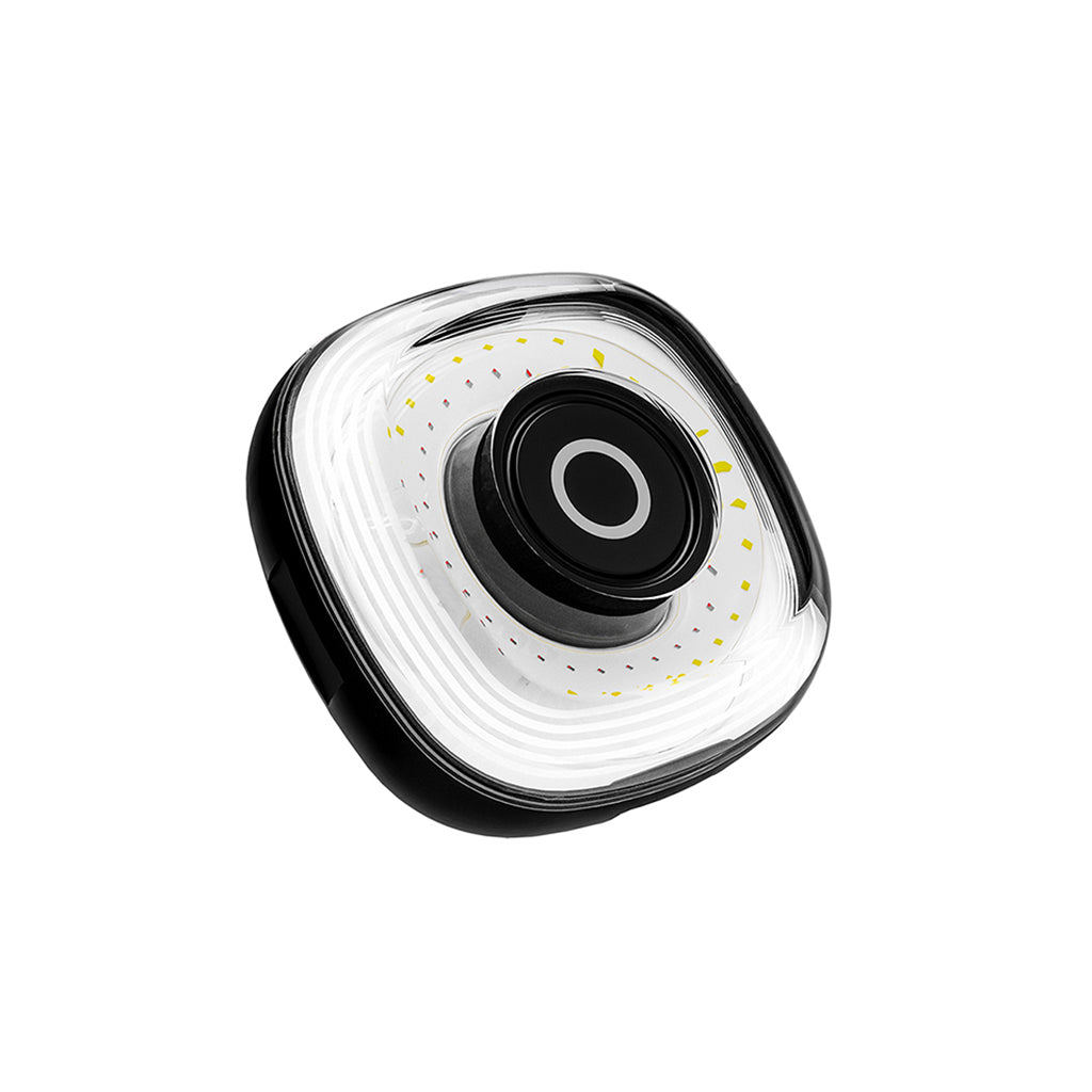 Magicshine SEEMEE 50 MAG smart magnetic rear light with red and white dual-color beam for cycling visibility.