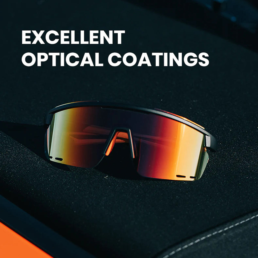 Magicshine Rouleur Photochromic Sports Sunglasses with a vibrant orange and red reflective lens, emphasizing the excellent optical coatings.