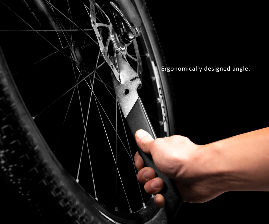 The Birzman Rotor Truing Fork, an ergonomic tool for controlled and precise bicycle rotor adjustments.