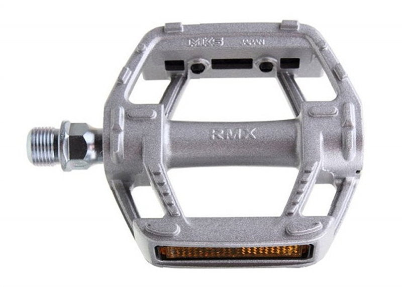 Close-up of the MKS RMX Silver pedal, highlighting its angled low-profile tread for grip with flat-soled shoes.