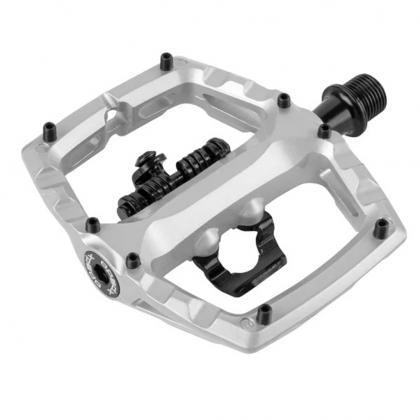 Close-up of Xpedo AMBIX pedal showing adjustable retention system and grip pins- grey
