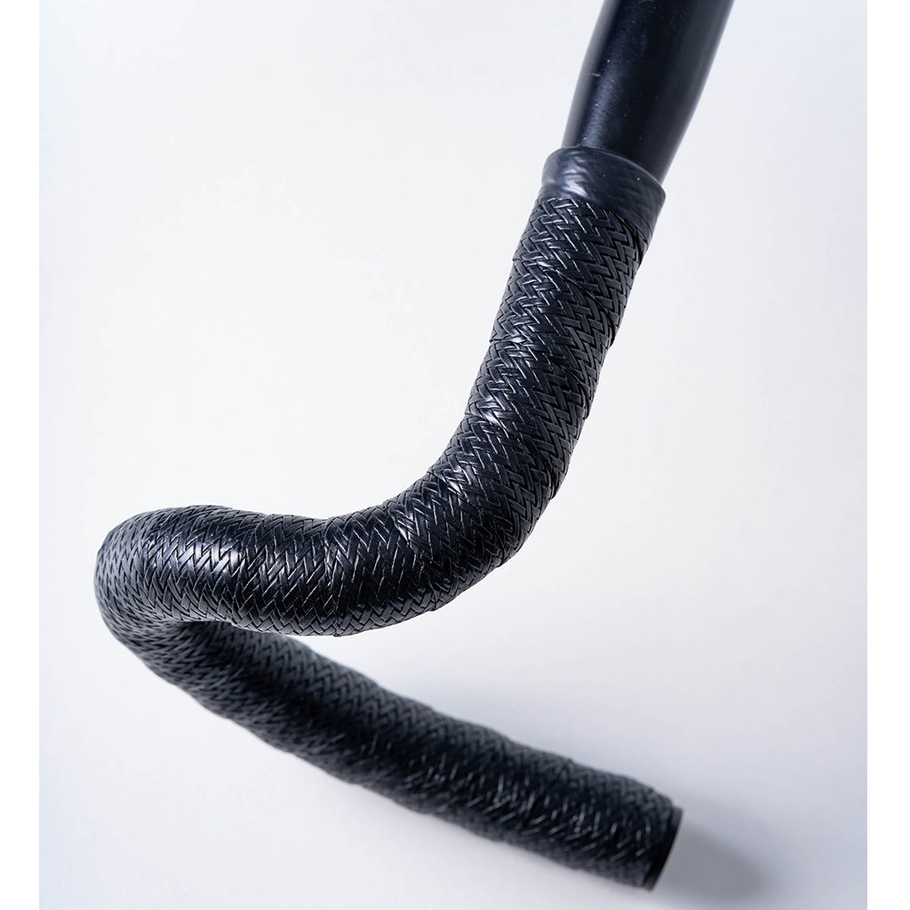 Underside view of BTP Faux Leather Bartape-Andiamo Black showing adhesive backing.