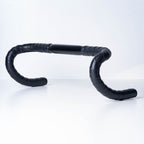 Full package contents of BTP Faux Leather Bartape-Andiamo Black including end plugs and tapes.