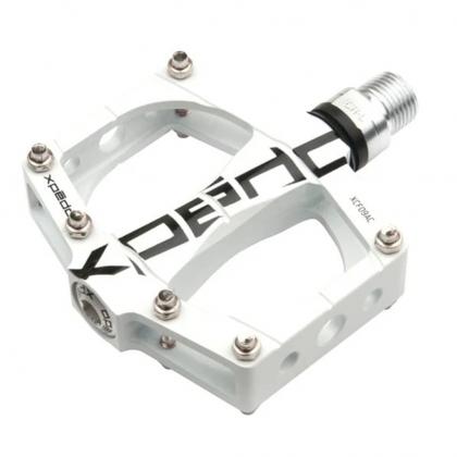 Close-up of Xpedo TRVS 9 pedal in white showing sealed bearing and chromoly spindle