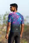 A man wearing and showcasing backside of Constellation race fit cycling jersey