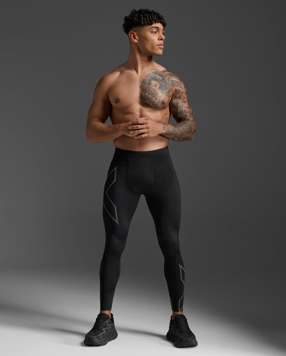 2XU Light Speed Compression Tights in Black/Black Reflective, full body front view on a male model.