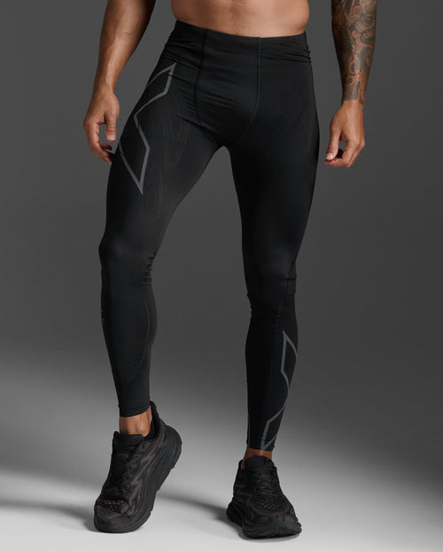 Close-up front view of the 2XU Light Speed Compression Tights in Black/Black Reflective showing the reflective X thigh logo.