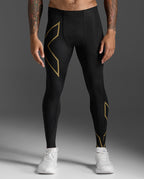 Close-up front view of the 2XU Light Speed Compression Tights showing the gold X thigh logo.