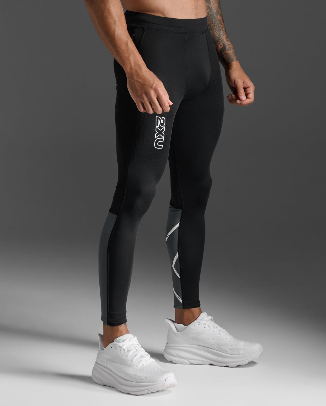 Front view of the 2XU Light Speed React Compression Tights highlighting the 2XU logo on the thigh.