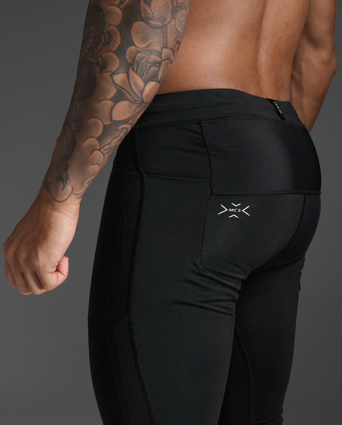 Close-up of the rear MCS hip pocket on the 2XU Light Speed React Compression Tights.