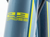 Front view of a red and black bike featuring the word "cross" on the frame, showcasing its sporty design