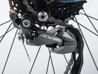 Rear derailleur mounted on the rear wheel of a red and black Author bicycle, model Vertigo 18