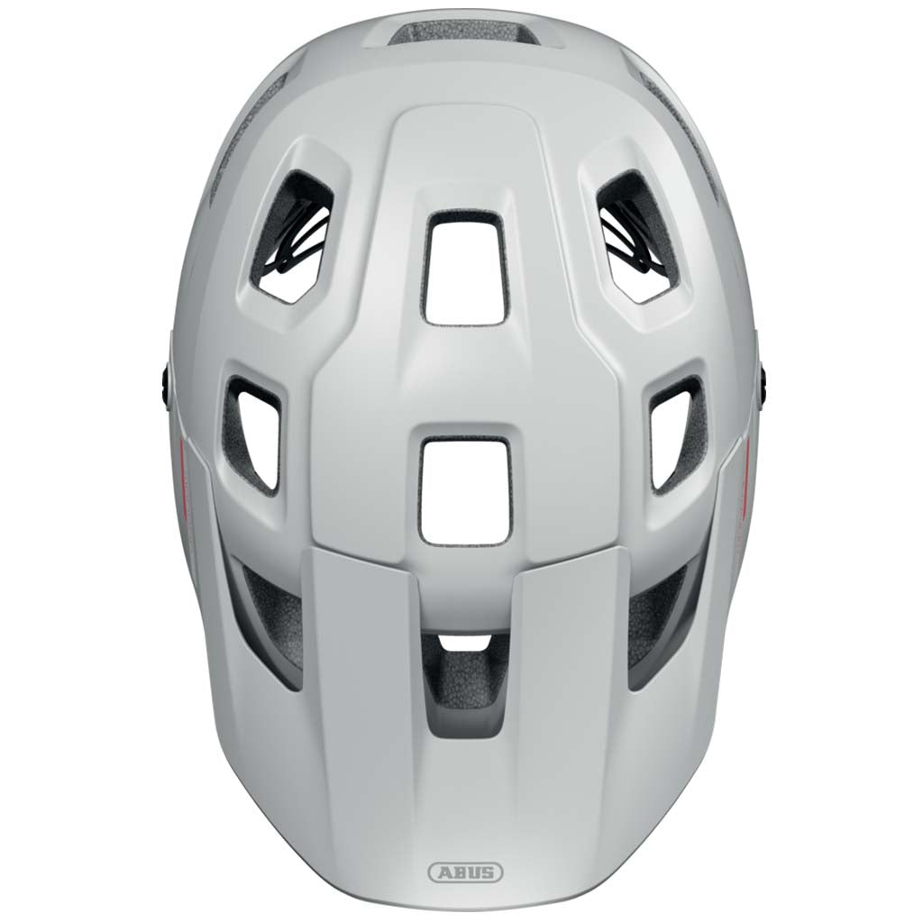 Abus MoDrop MTB helmet in Polar White, side profile showcasing excellent ventilation.
