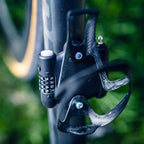 Lightweight Abus bike lock mounted under bottle holder for short stops.

