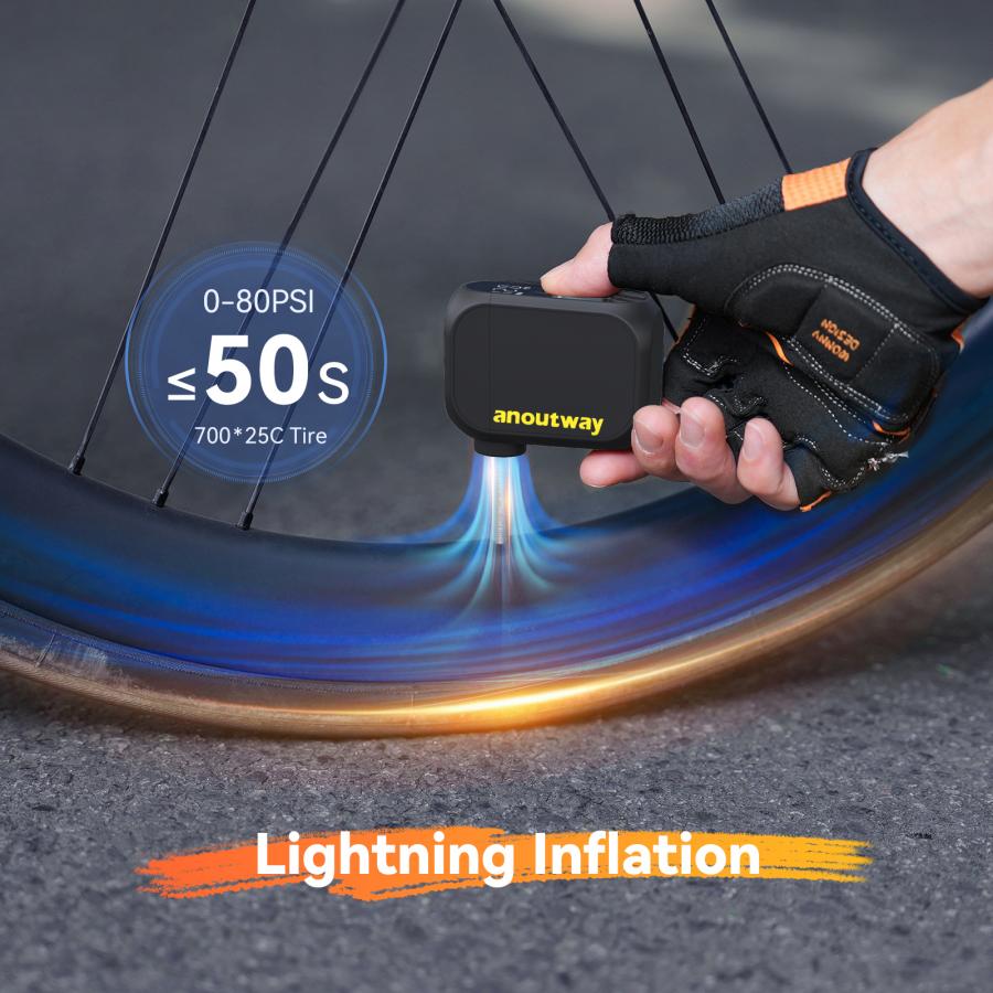 Cyclist inflating road bike tire with Anoutway AS210 Pro electric pump