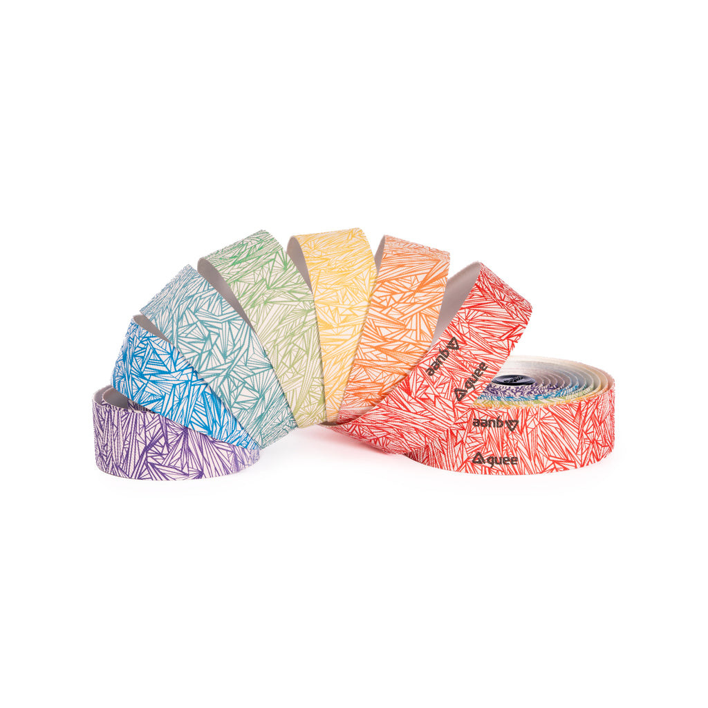 Close-up of GUEE Attitude Fade Rainbow bike handlebar tape, highlighting the eco-friendly TPU material and unique color transition.

