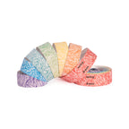 Close-up of GUEE Attitude Fade Rainbow bike handlebar tape, highlighting the eco-friendly TPU material and unique color transition.

