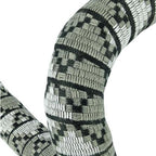 A black and white snake coils around a white object, showcasing the BTP Woven bicycle Bar tape in Jungle Grey