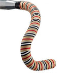 Bicycle handle and striped seat, wrapped in berry brown and black BTP Woven Bartape, showcasing a stylish design