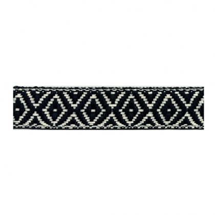 Close-up of a black and white bicycle  btp bartape in diamond-patterned bartape