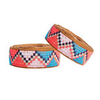 Two vibrant beaded bicycle bartape featuring a brown and pink design, perfect for a summer vibe.
