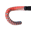 Colorful bicycle handle featuring jungle summer designs on woven bartape.