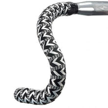 bicycle handlebar wrapped in chevron-patterned tape, showcasing a BTP bike handlebar tape