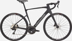 Full view of the black Cannondale Synapse Carbon 5 endurance road bike, highlighting its sleek carbon frame design.