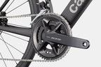 Close-up of the Cannondale Synapse Carbon 5's drivetrain, highlighting the Shimano 105 crankset and front derailleur.