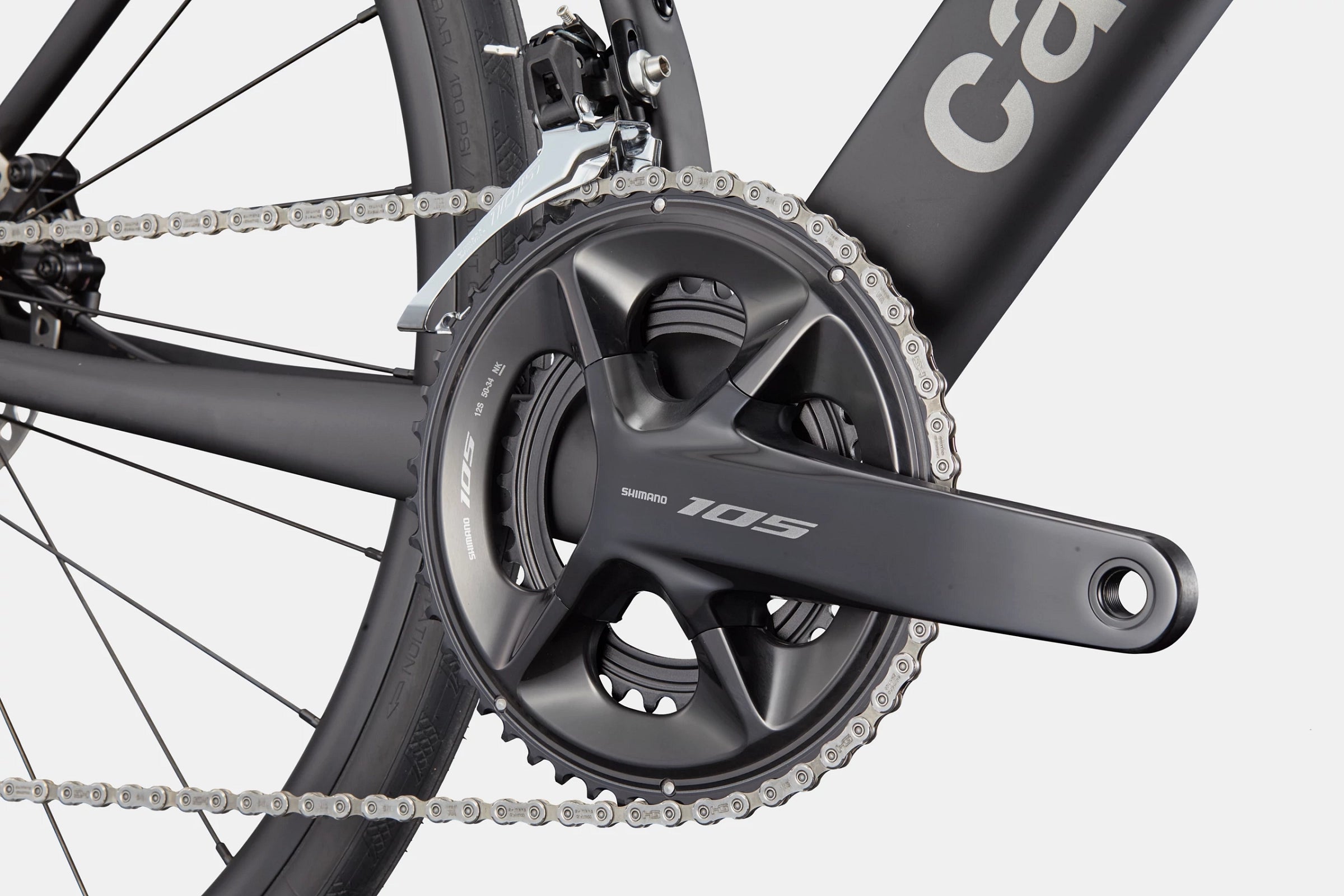 Close-up of the Cannondale Synapse Carbon 5's drivetrain, highlighting the Shimano 105 crankset and front derailleur.