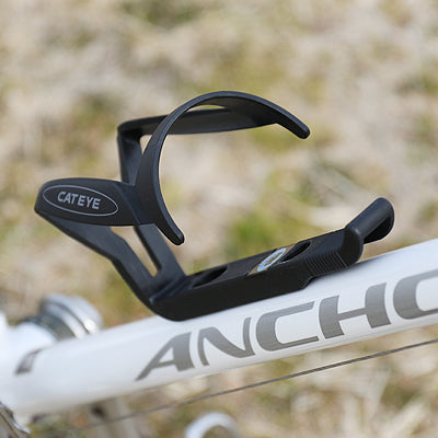 Cateye BC-300 bottle cage mounted on a bicycle frame.
