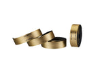 Vibration damping high-density foam bar tape with UFO Lock-in plugs in the Royal Gold color.