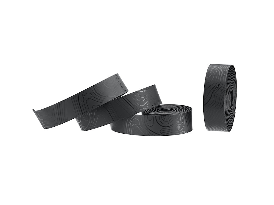 Vibration damping high-density foam bar tape with UFO Lock-in plugs in black.