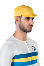 Man wearing yellow Hustle Unisex Cycling Cap