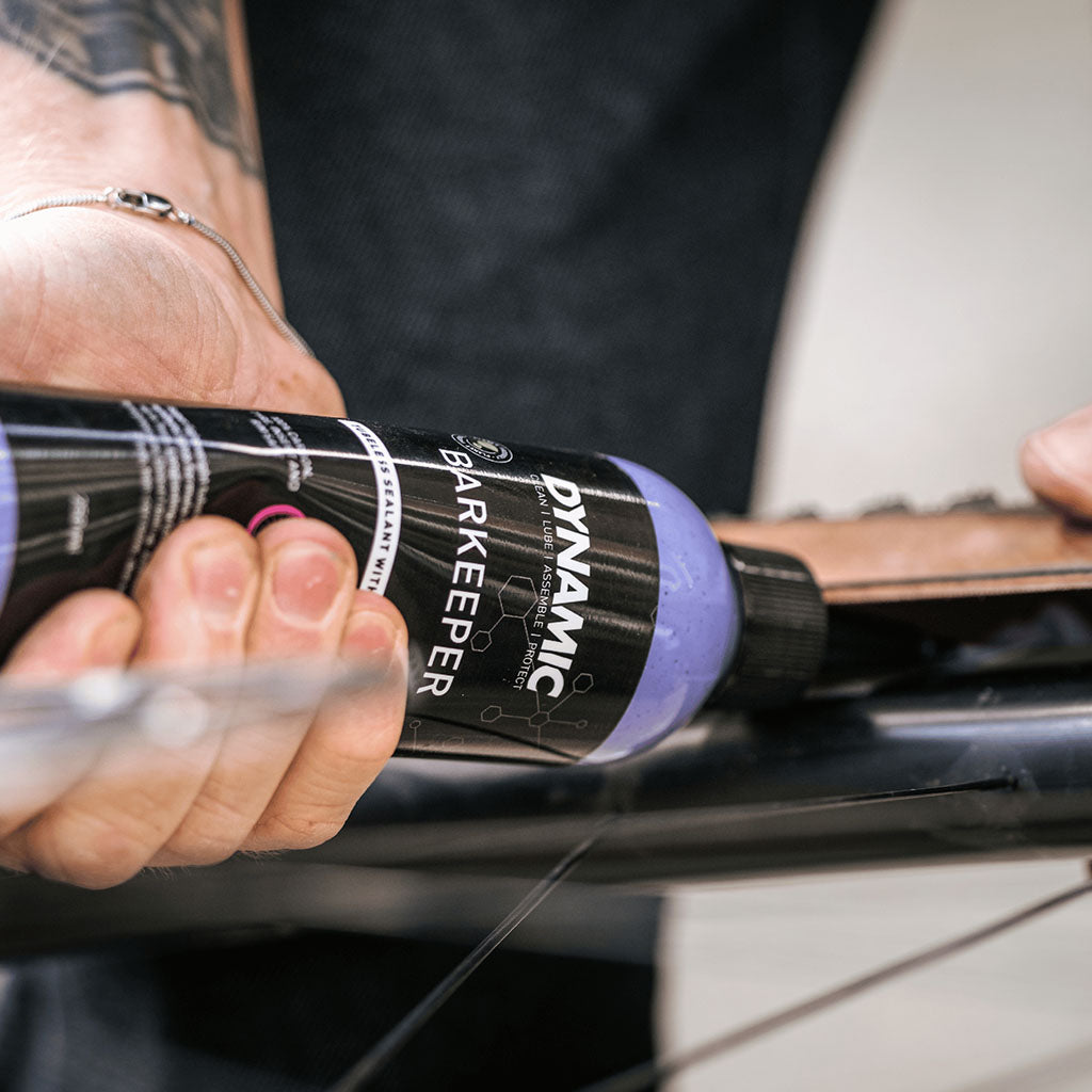 Close-up of Dynamic Barkeeper sealant being injected into a tubeless tire