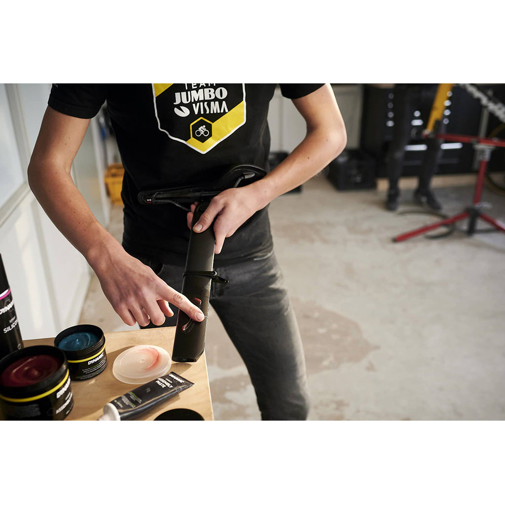 Close-up of Dynamic Carbon Assembly Paste being applied to a carbon seatpost