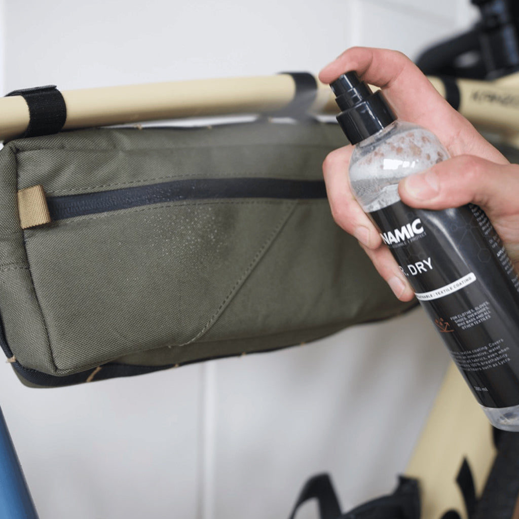 Dynamic waterproof spray for bikepacking accessories and sports gear