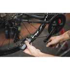 A close-up of Dynamic’s high-performance wet chain lubricant designed for extreme weather cycling.

