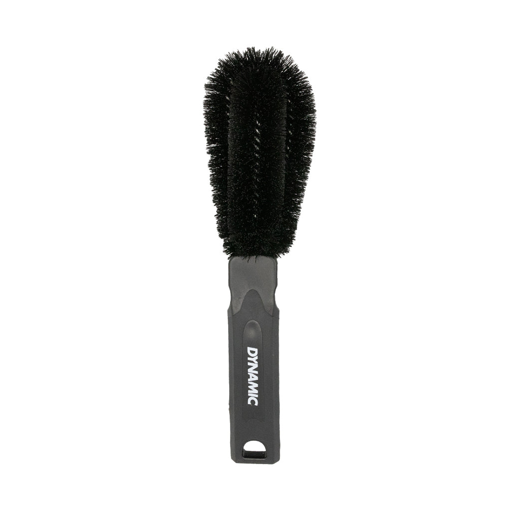 A durable nylon bristle brush designed for removing grime from bicycle wheels.

