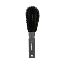 A durable nylon bristle brush designed for removing grime from bicycle wheels.

