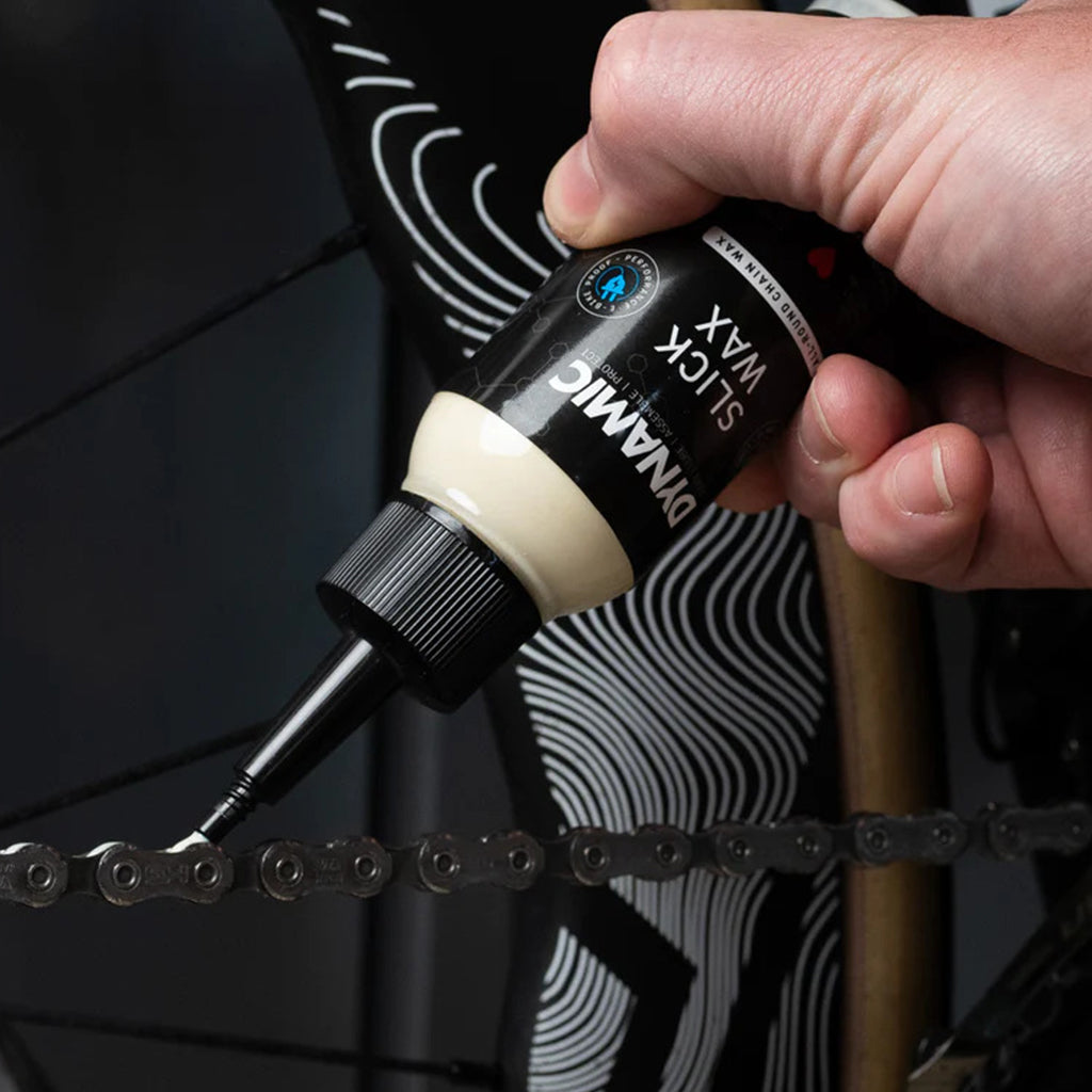 Close-up of Dynamic Slick Wax 50ml, emphasizing its advanced formula for smooth bike chain operation.