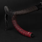 GUEE Attitude Fade Red bar tape, featuring a distinctive gradient pattern for a high-performance and stylish bike upgrade.