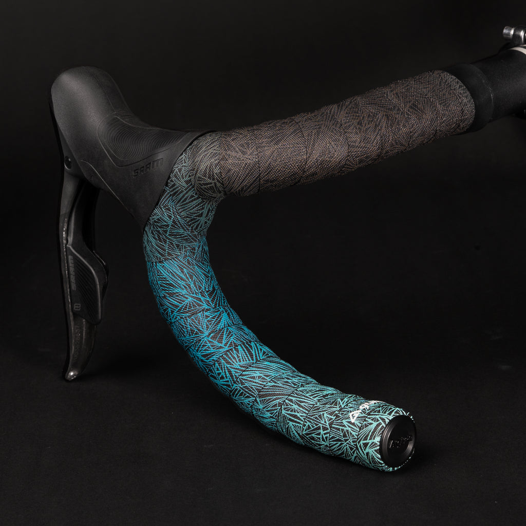  GUEE Attitude Fade Celeste Bar Tape Close-up of GUEE Attitude Fade Celeste bicycle handlebar tape, showing the gradient color transition from light blue to a creamy white.