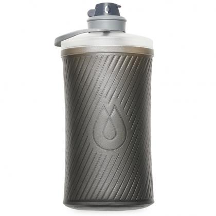 Hydrapak Flux bottle beside packed camping gear  compact hydration for minimalist backpackers


