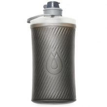 Hydrapak Flux bottle beside packed camping gear  compact hydration for minimalist backpackers


